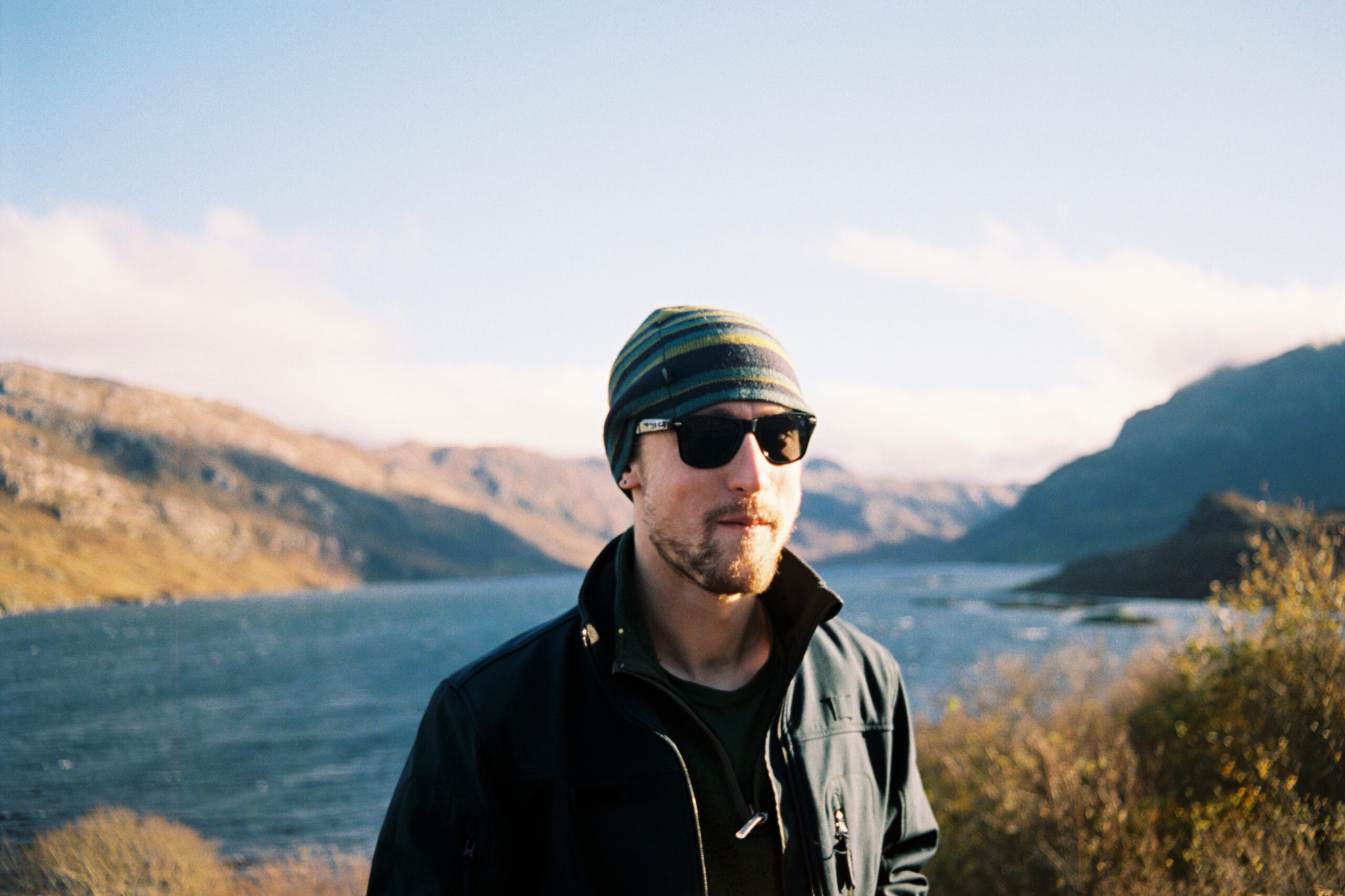 Portrait of a man in front of Loch Glencoul, Assynt, Scotland