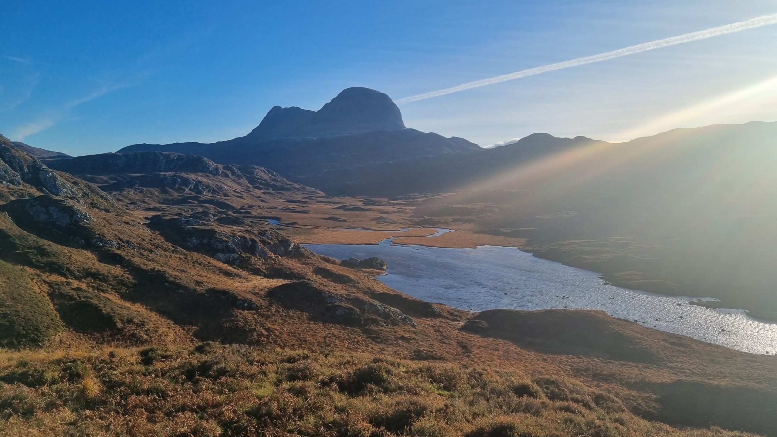 The landscape of Assynt, Scotland with Suilven in the distance
