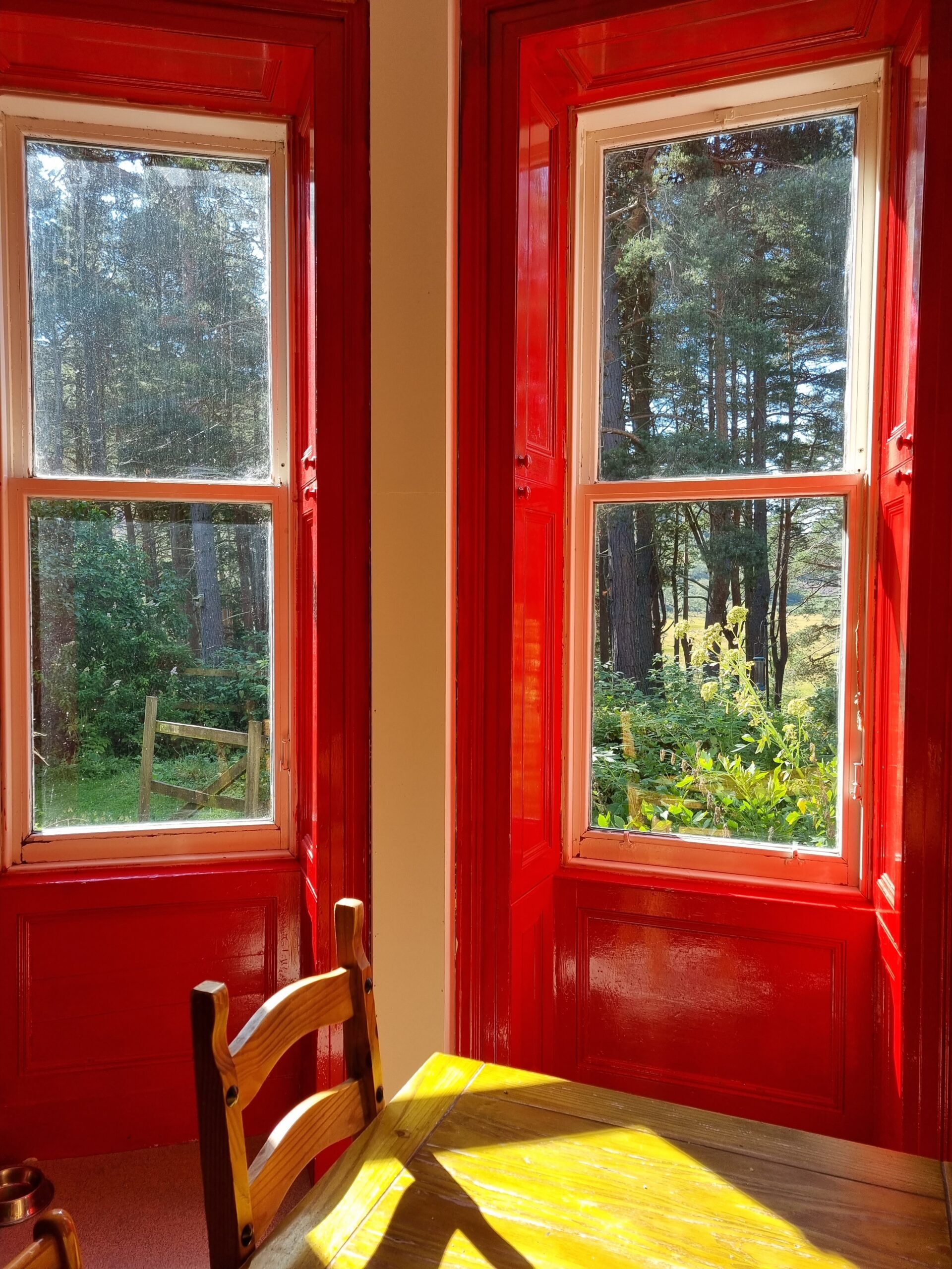 Red window frames in Braemar Youth Hostel, Cairngorms