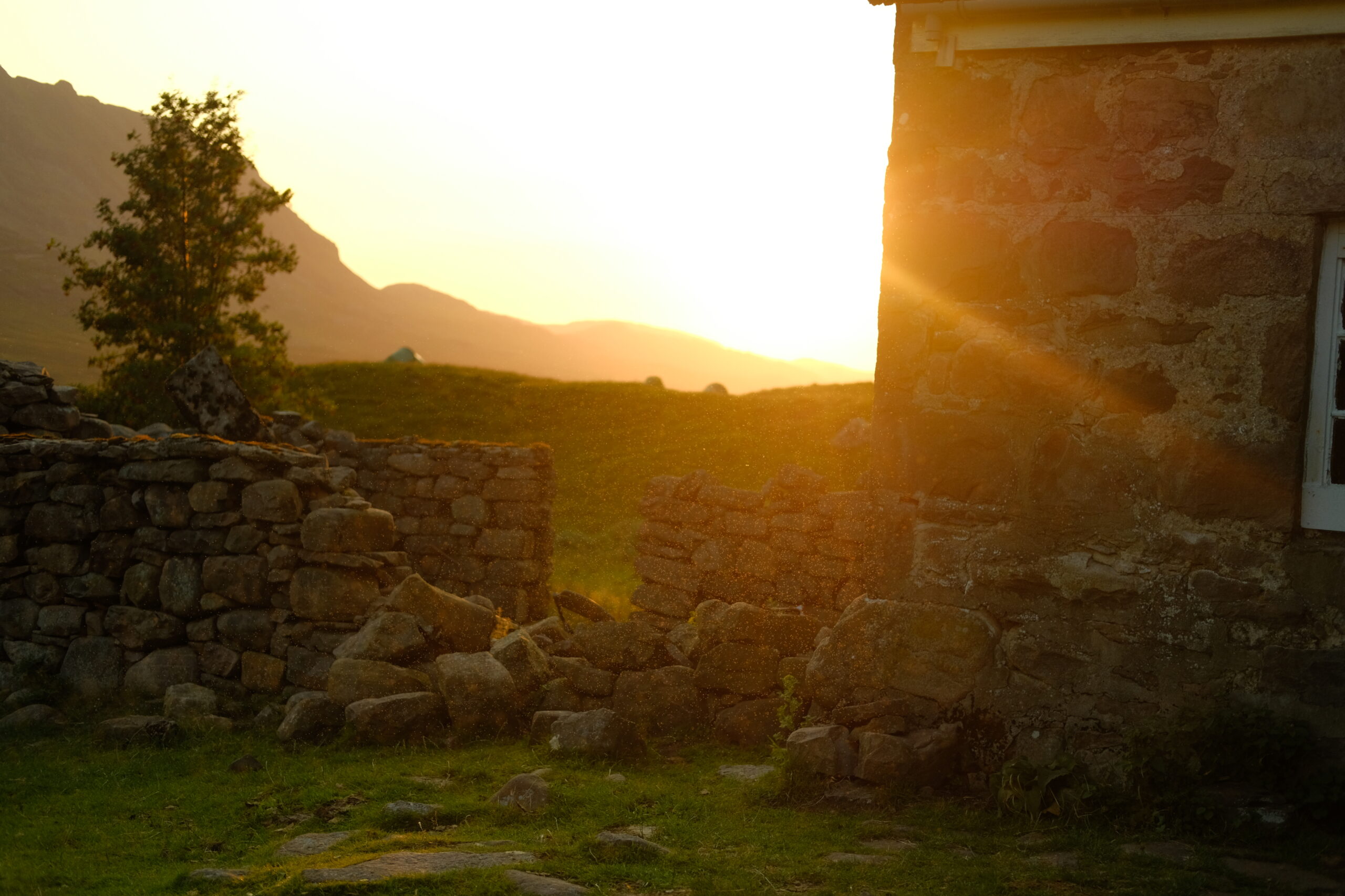 Midges at sunset at Shenavall Bothy, Scottish Highlands