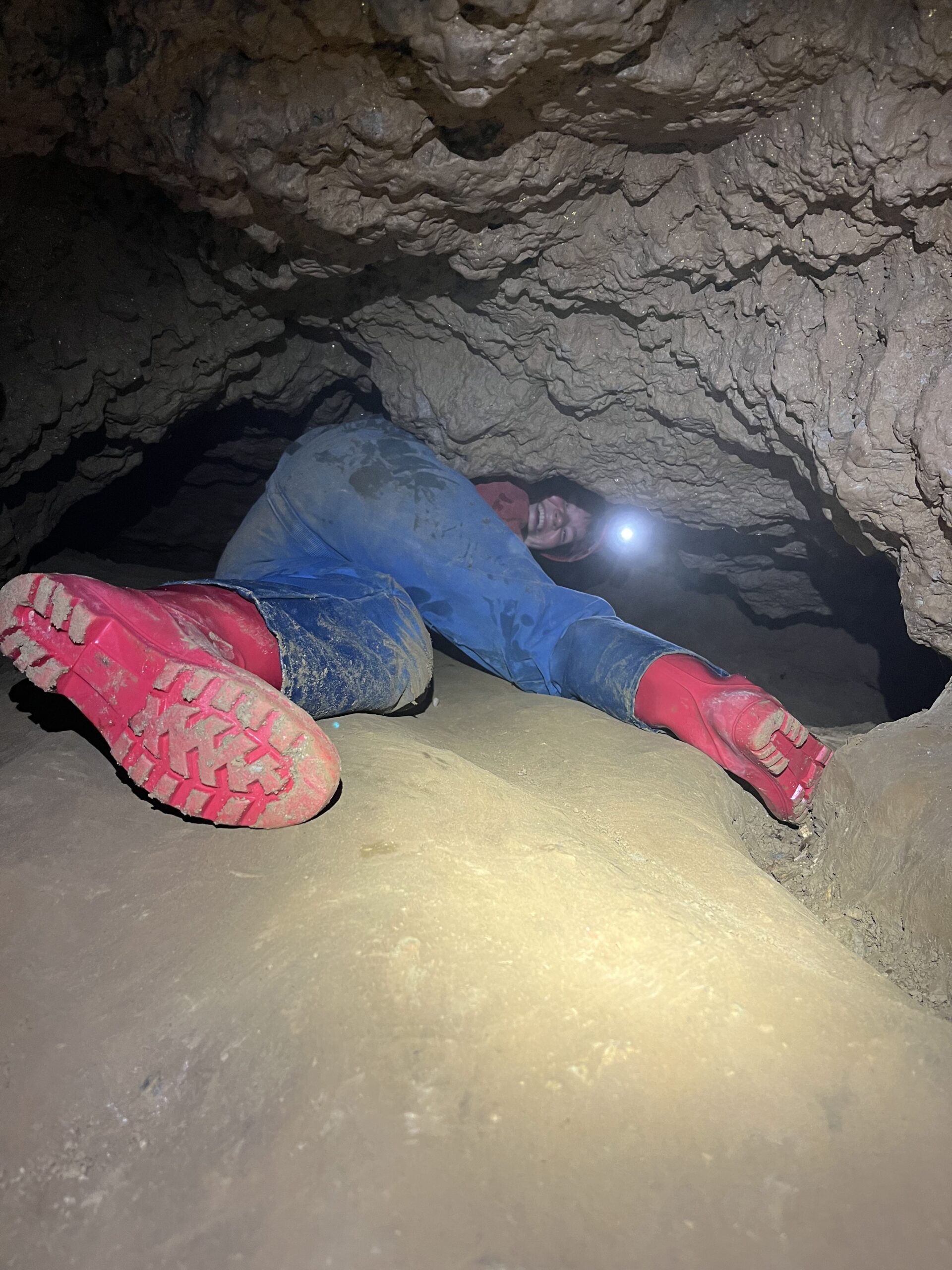 A caver in Cnoc nan Uamh, Assynt
