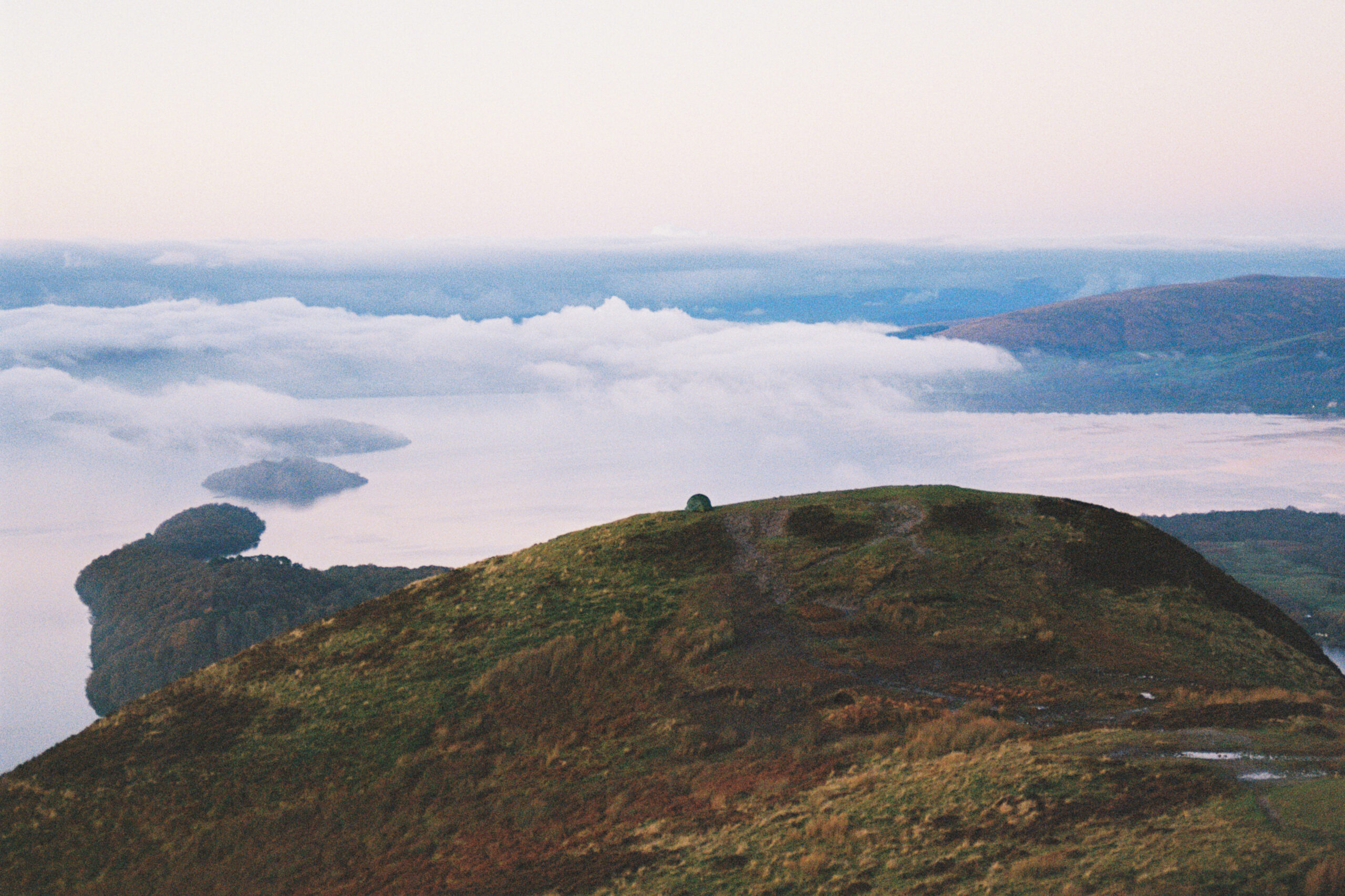 A tent wild camping on the top of Conic Hill, Scotland