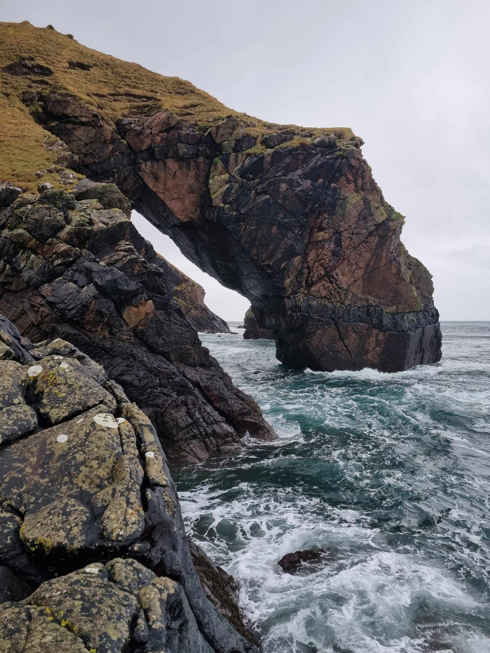 Natural arch in Guirdil Bay, Rùm
