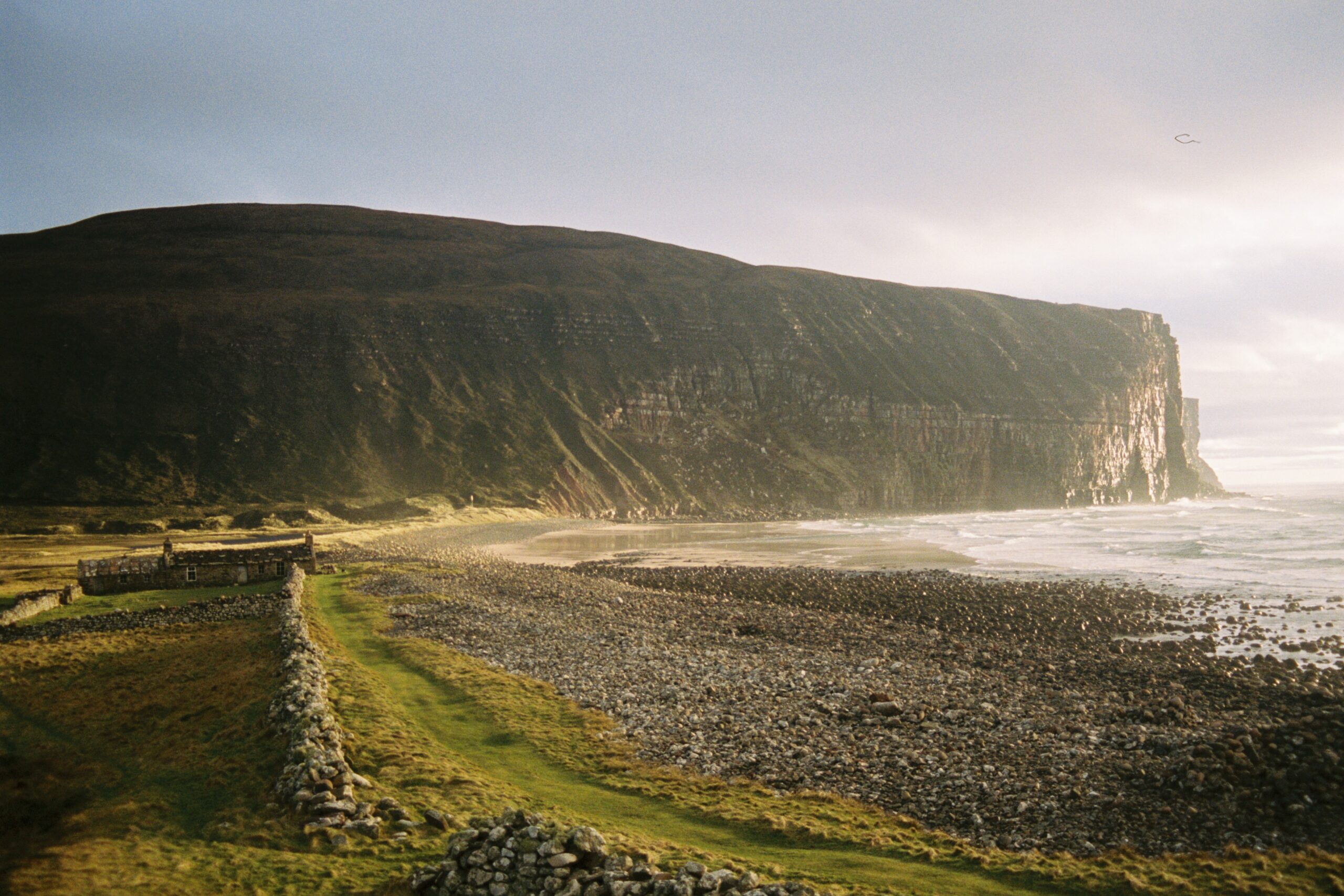 cliffs of rackwick bay with burmouth bothy, hoy, orkney