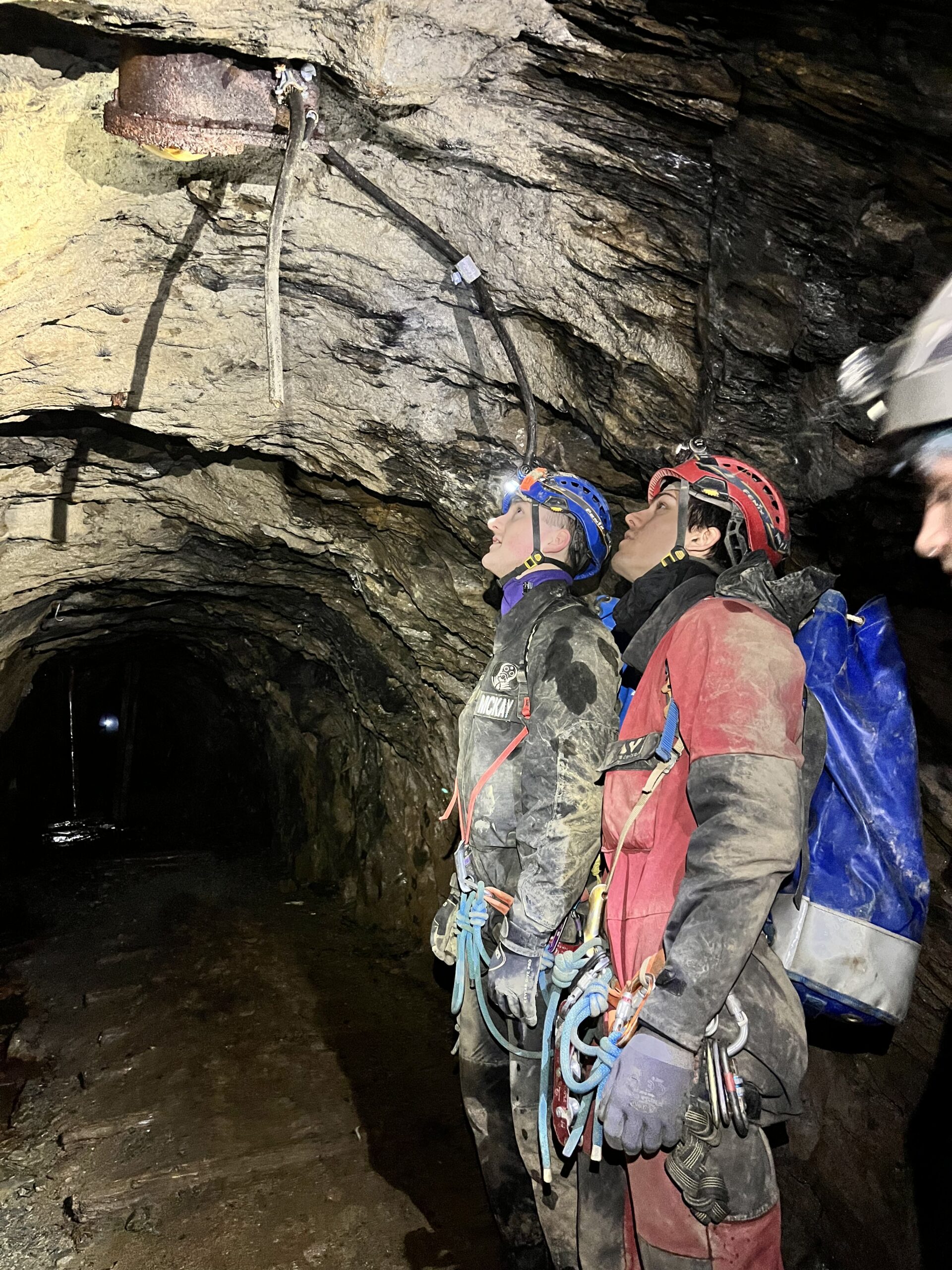 Cavers in tunnel of Croesor mine, North Wales